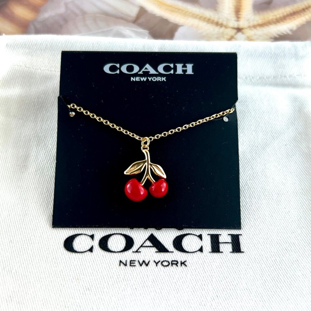 Coach Red Cherry gold necklace